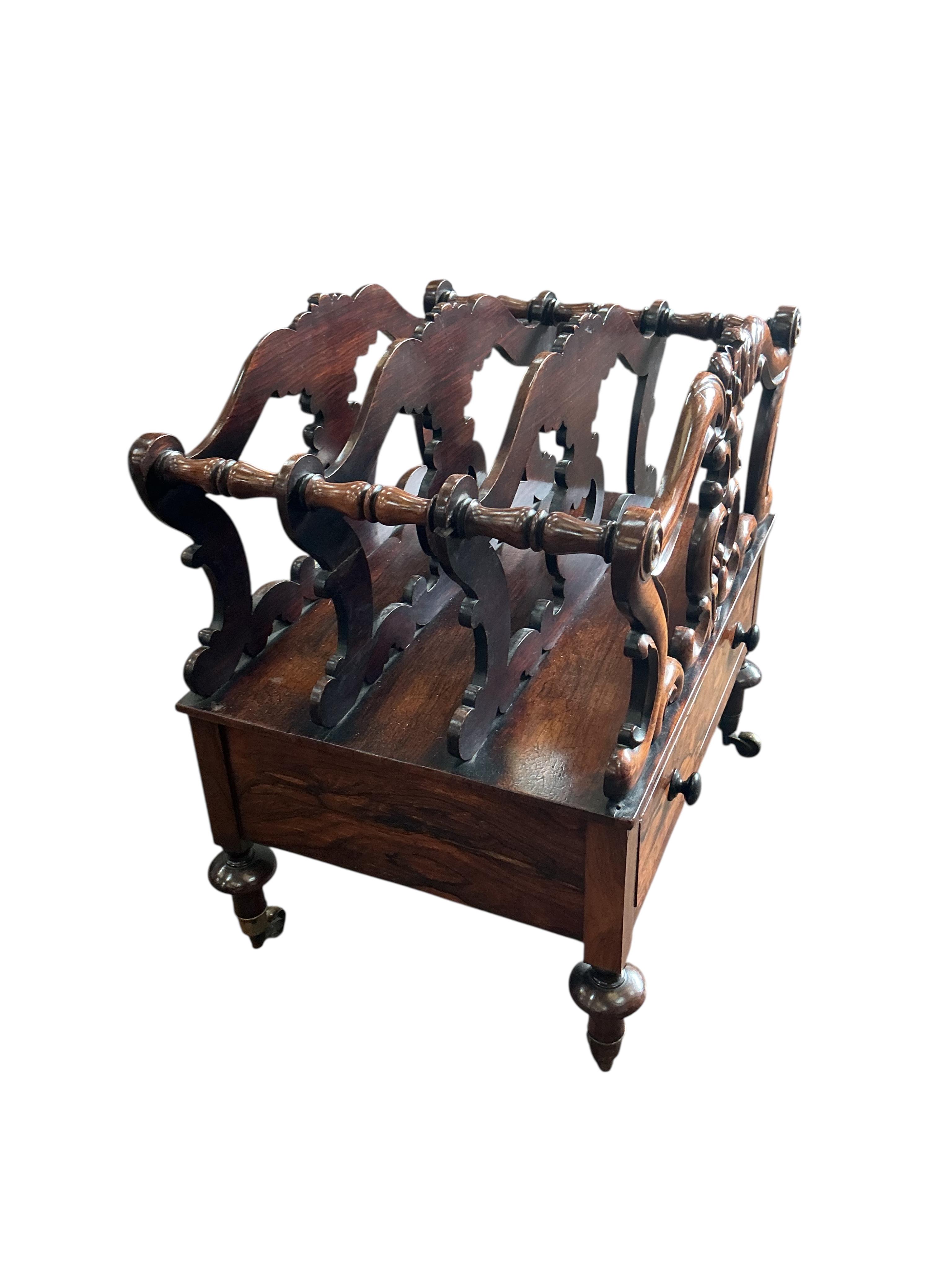 A Victorian rosewood three division Canterbury, width 56cm, depth 41cm, height 58cm